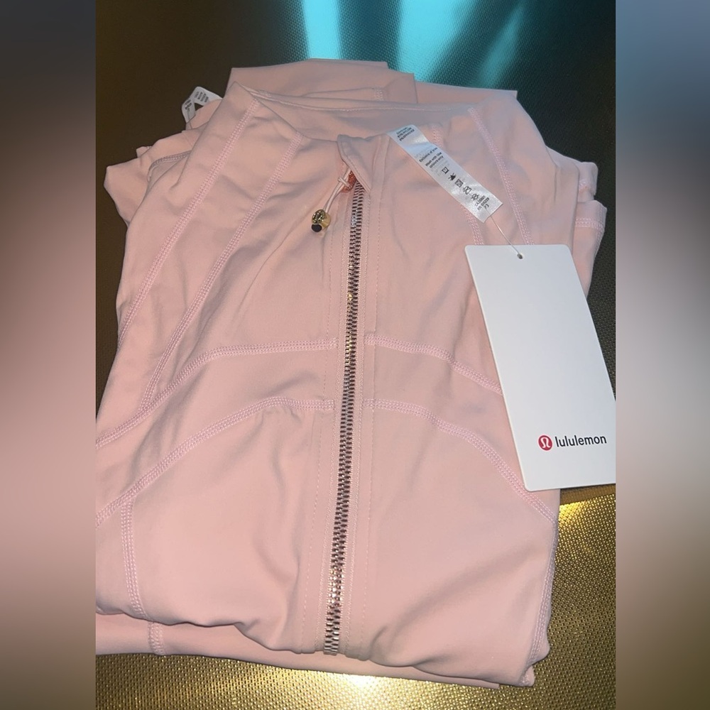 lululemon light pink zip-up jacket